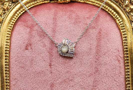 The Satnin' pendant featuring fabric from Elvis owned clothing with letter of authenticity