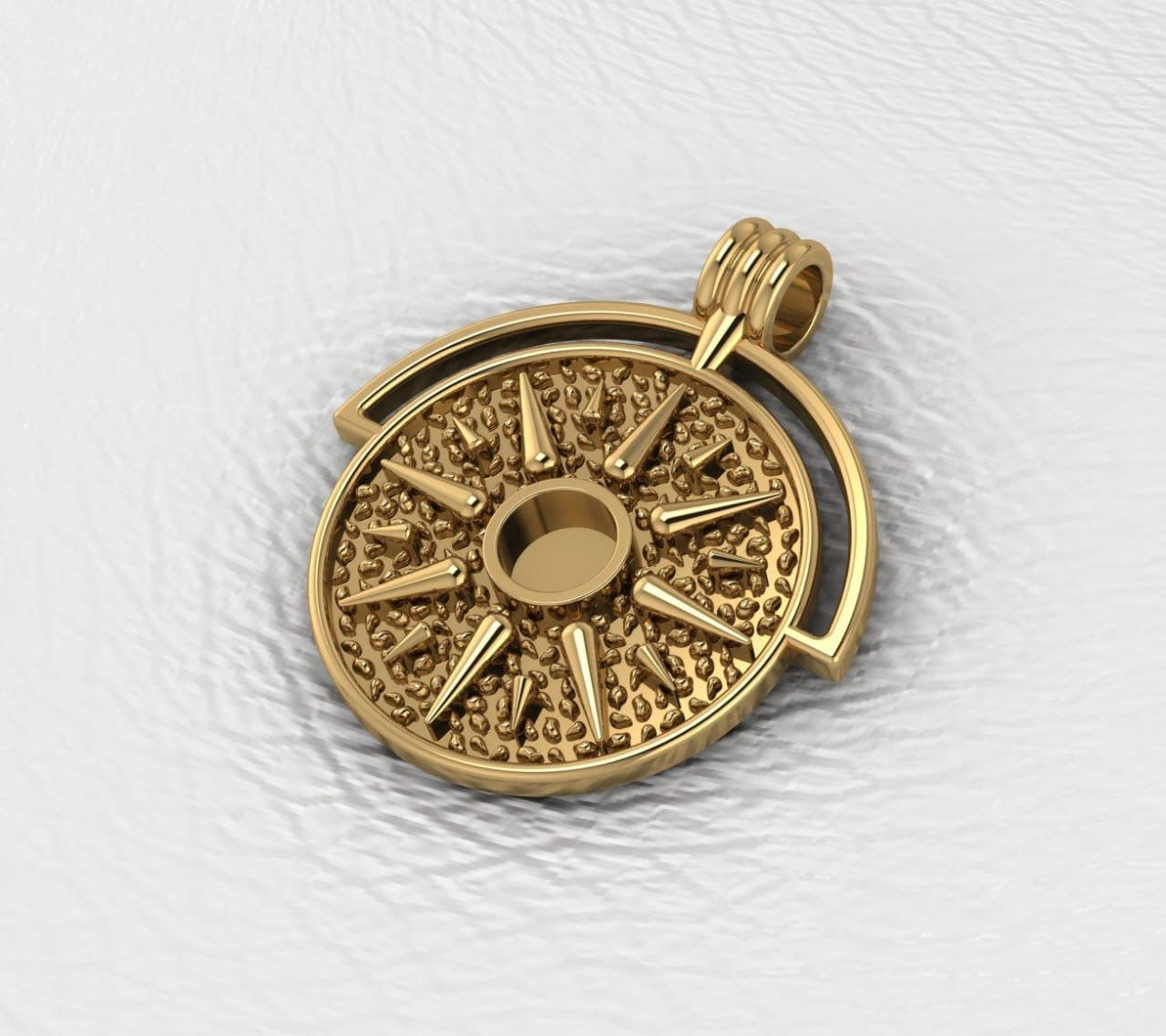 The Sun pendant featuring fabric from Elvis owned clothing with letter of authenticity