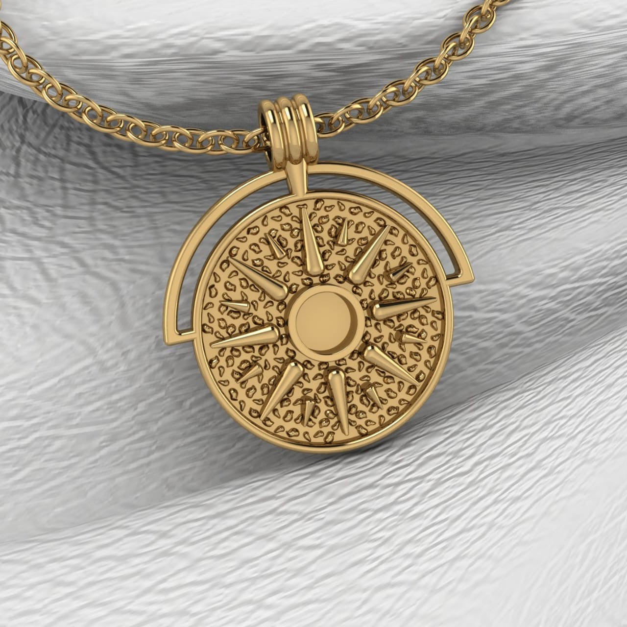 The Sun pendant featuring fabric from Elvis owned clothing with letter of authenticity