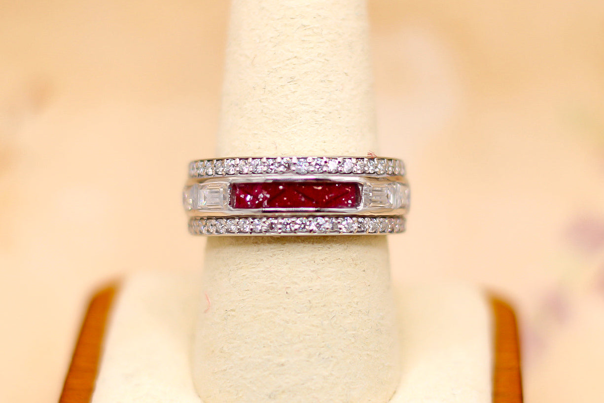 The queen's ring featuring fabric from Elvis owned clothing with letter of authenticity