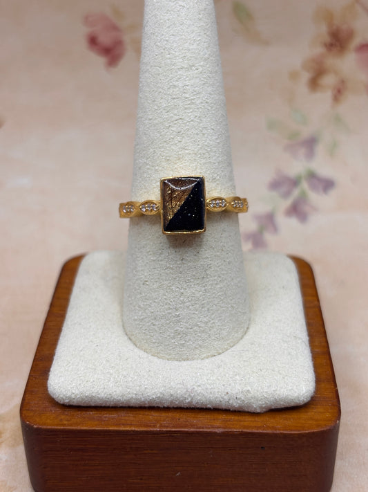 Women’s small rectangle ring with fabric from Elvis owned clothing and hair from tbe Becky Tewell collection
