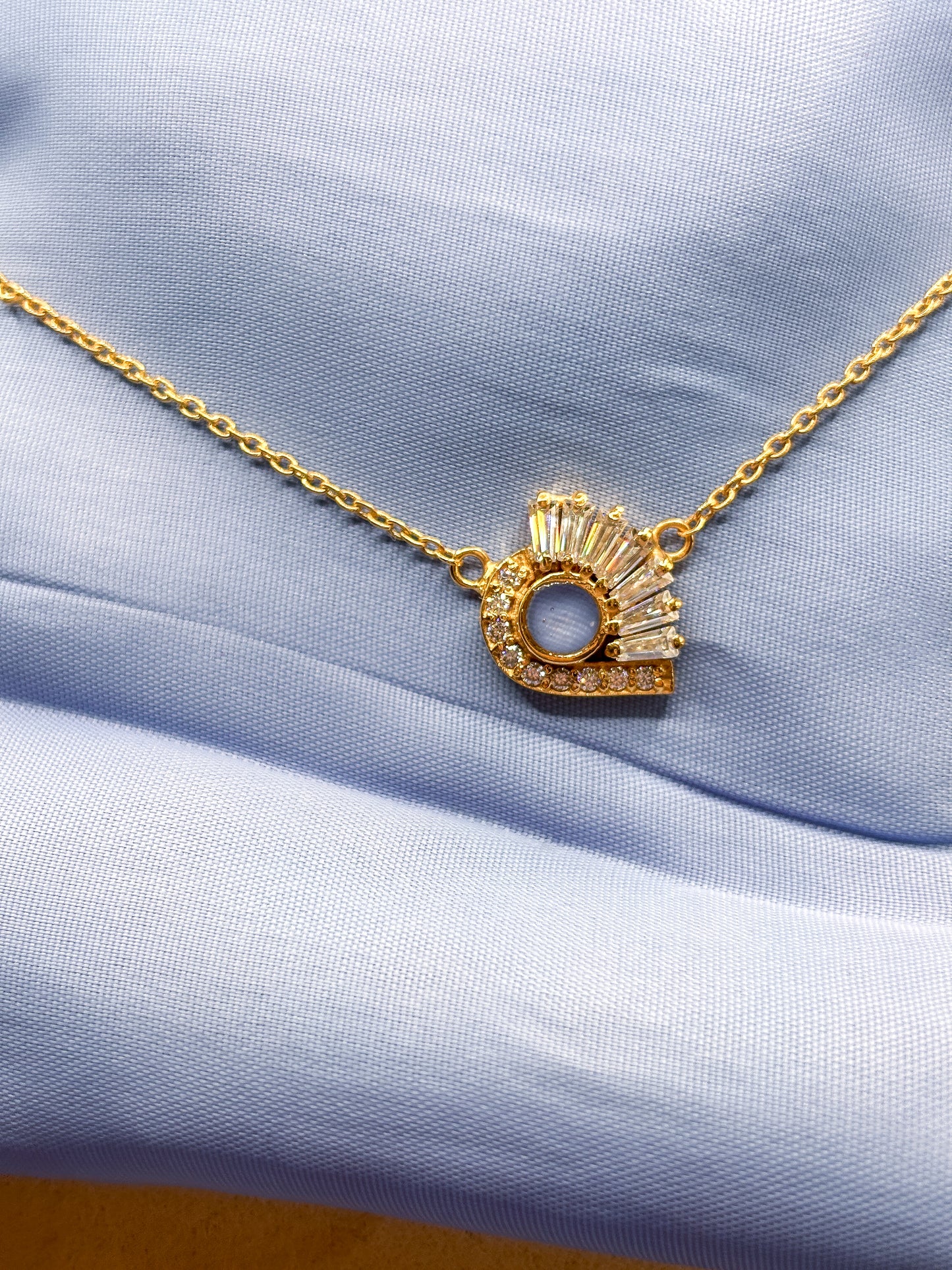 The Satnin' pendant featuring fabric from Elvis owned clothing with letter of authenticity