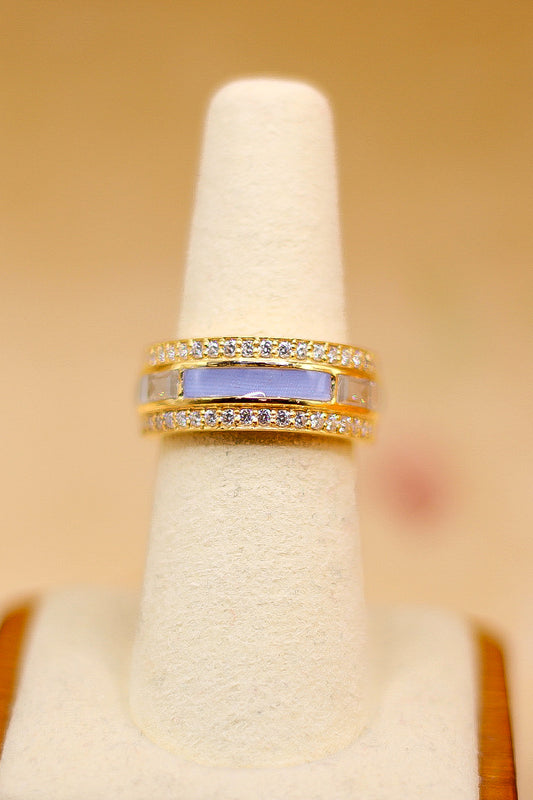 The queen's ring featuring fabric from Elvis owned clothing with letter of authenticity