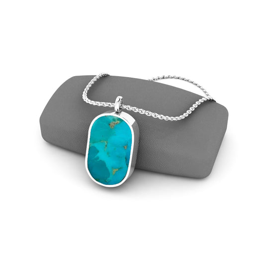 Gemstone locket featuring fabric from Elvis owns clothing with letter of authenticity