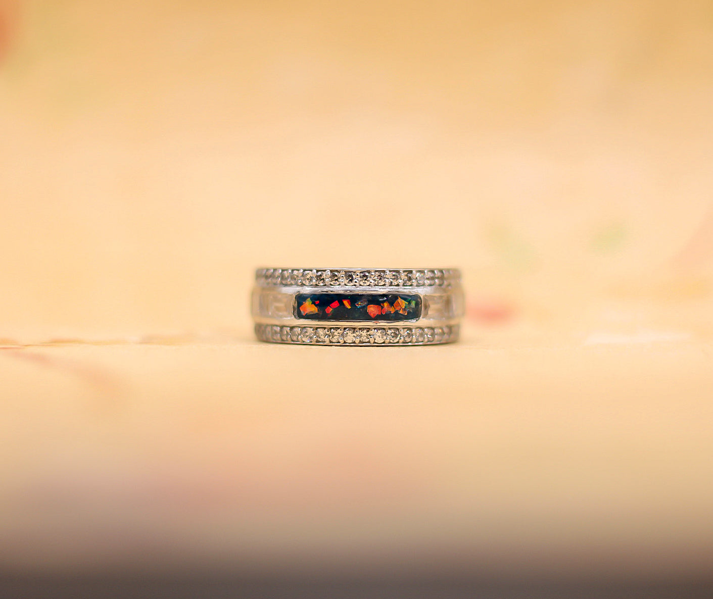 The queen's ring featuring fabric from Elvis owned clothing with letter of authenticity