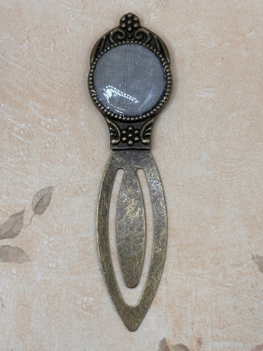 Antiqued bronze bookmark with fabric from Elvis owned clothing