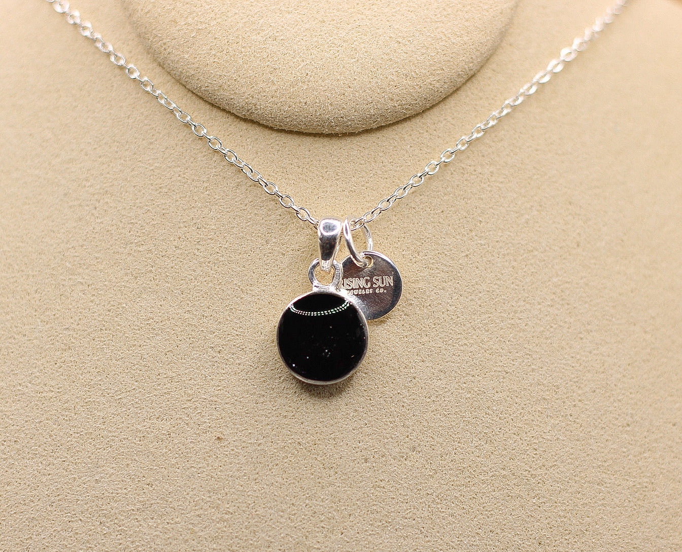 The Rising Sun pendant featuring fabric from Elvis owned clothing with letter of authenticity