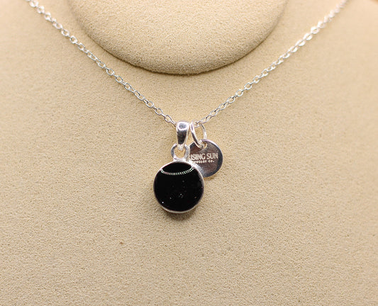 The Rising Sun pendant featuring fabric from Elvis owned clothing with letter of authenticity