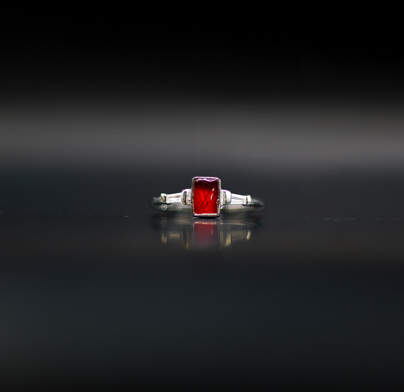 The Memphian ring featuring fabric from Elvis owned clothing with letter of authenticity