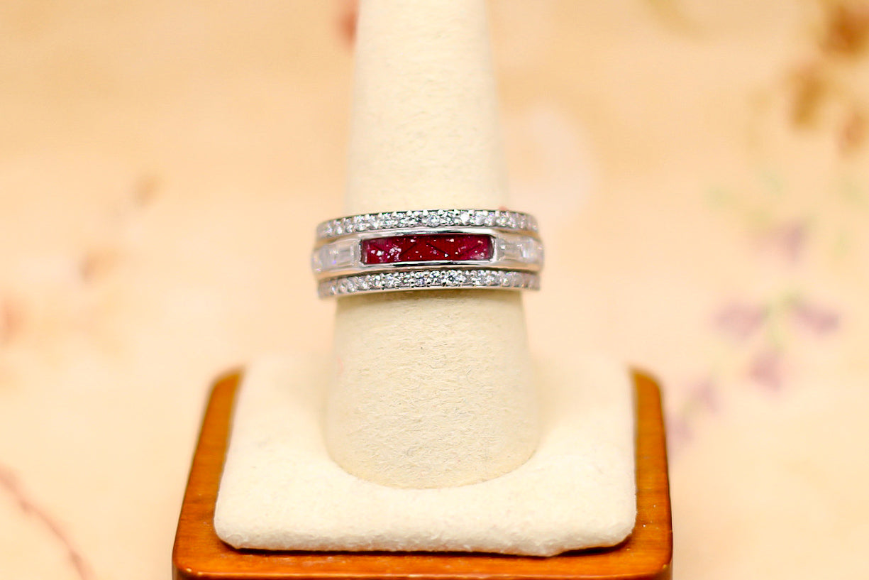 The queen's ring featuring fabric from Elvis owned clothing with letter of authenticity