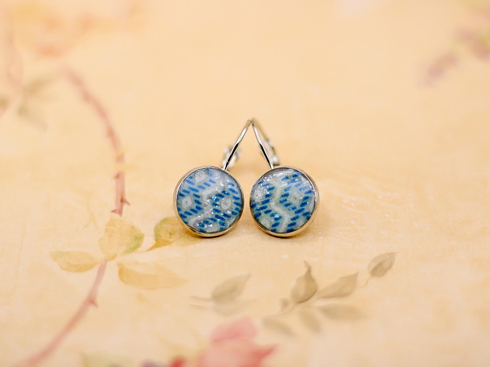 Elvis owned clothing swatch drop earrings with letter of authenticity