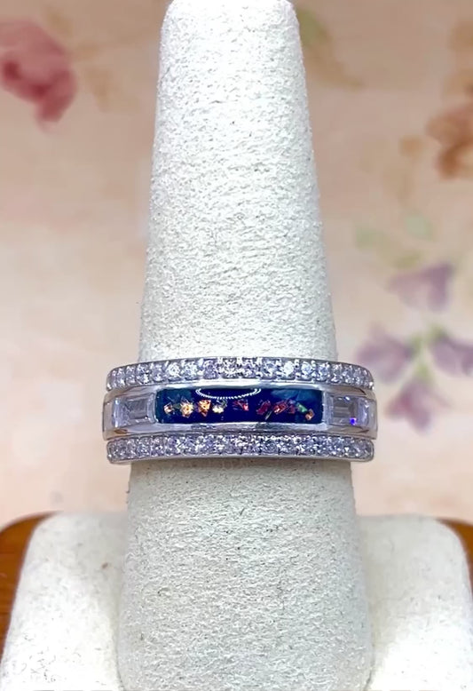 The queen's ring featuring fabric from Elvis owned clothing with letter of authenticity